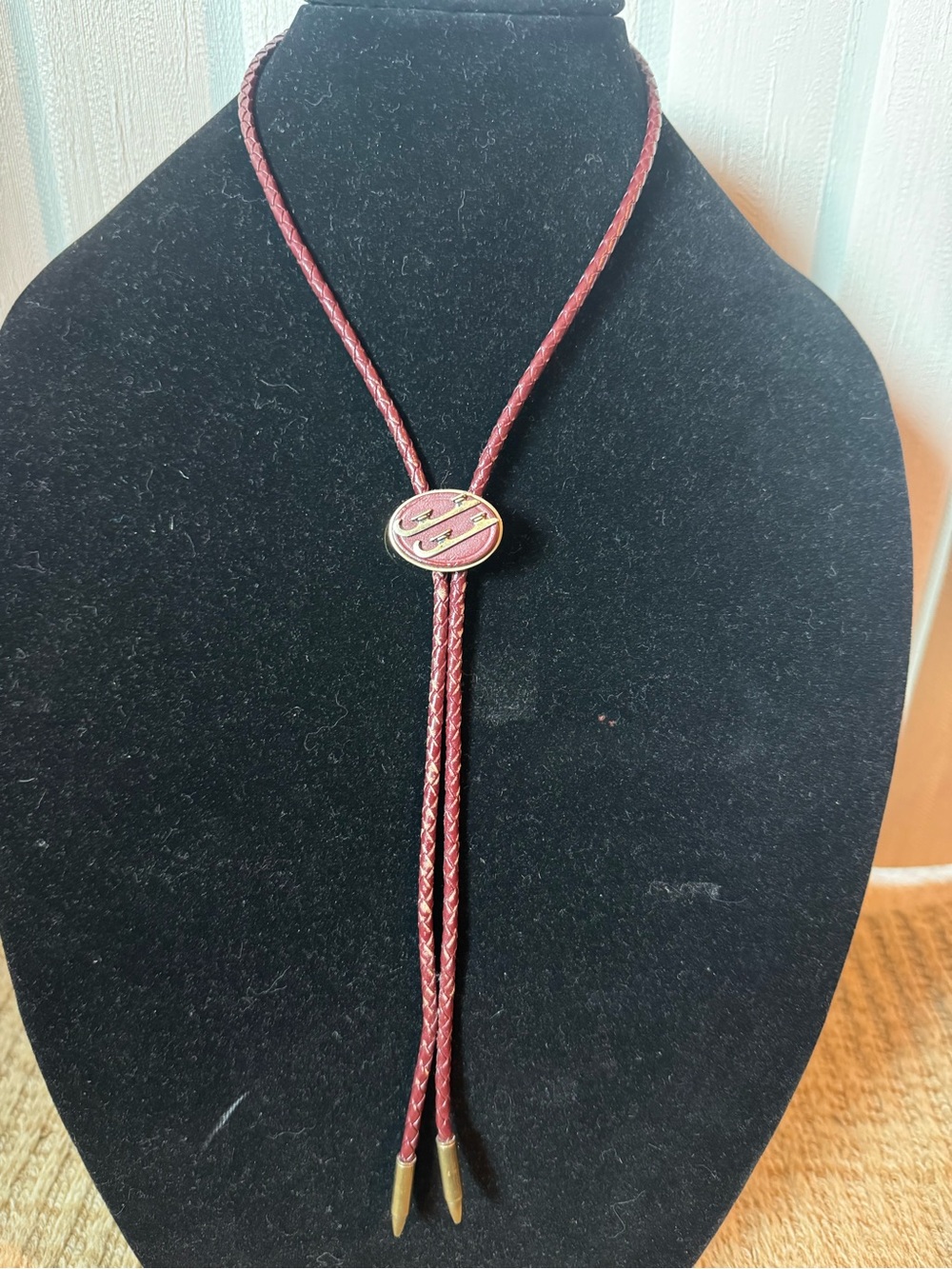 Dark Brown Braided Leather Bolo Tie with Gold Skate Accent